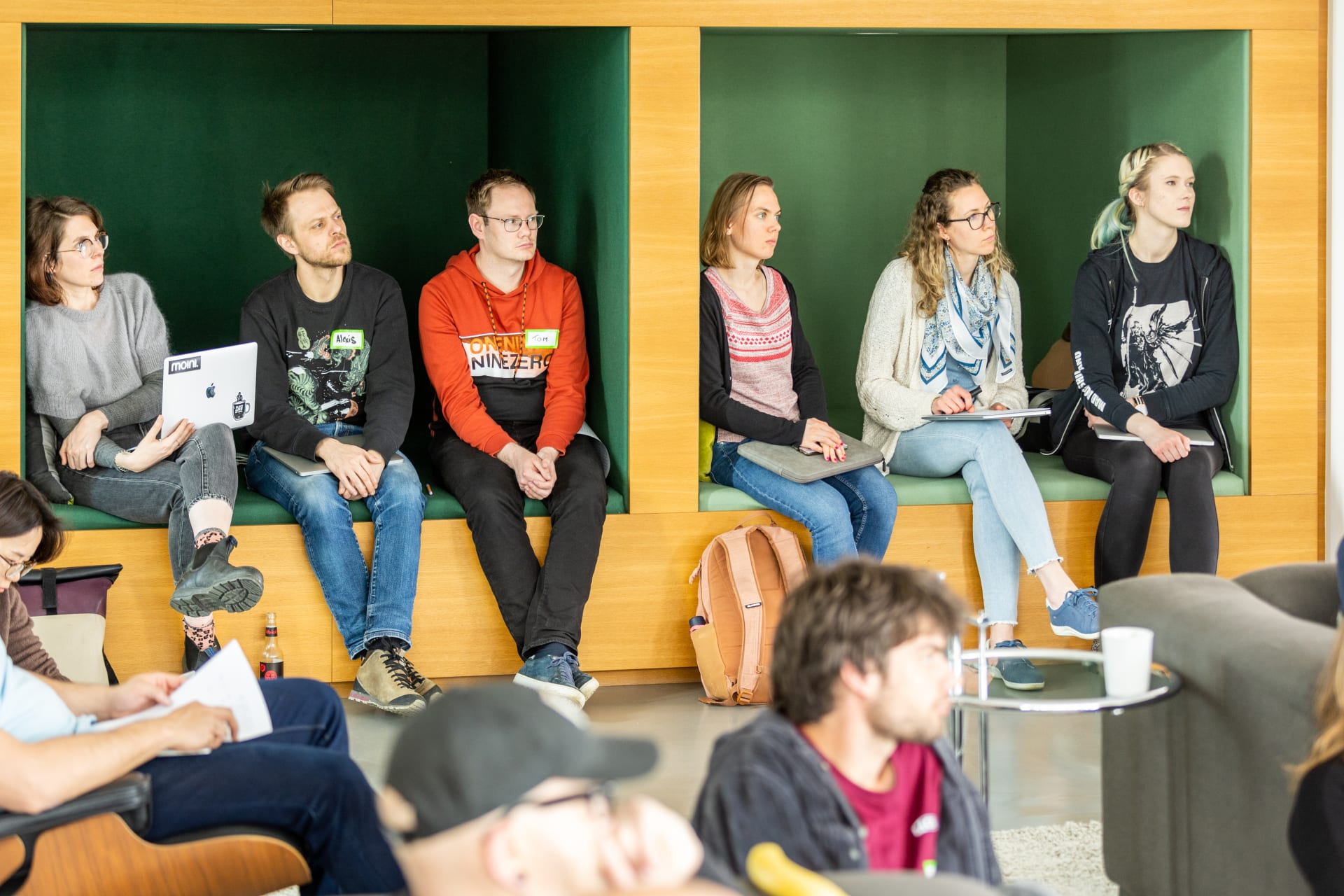 Group of people learning from a talk