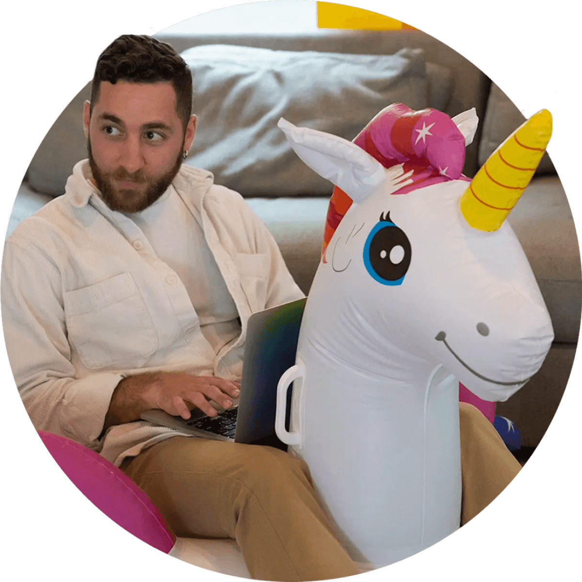 Guy working sitting on a unicorn