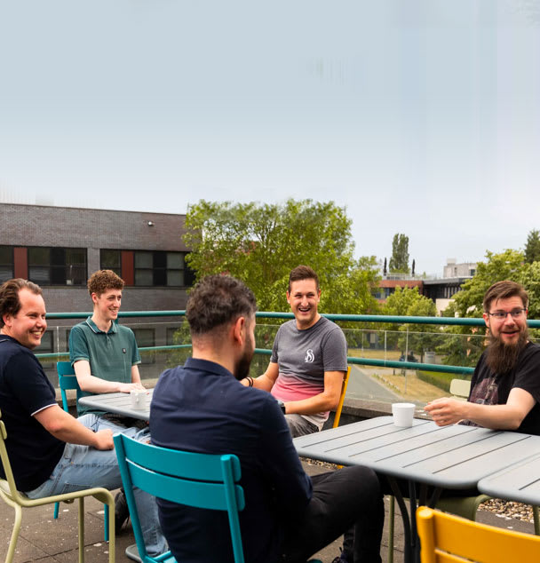 IT team having a coffee outside