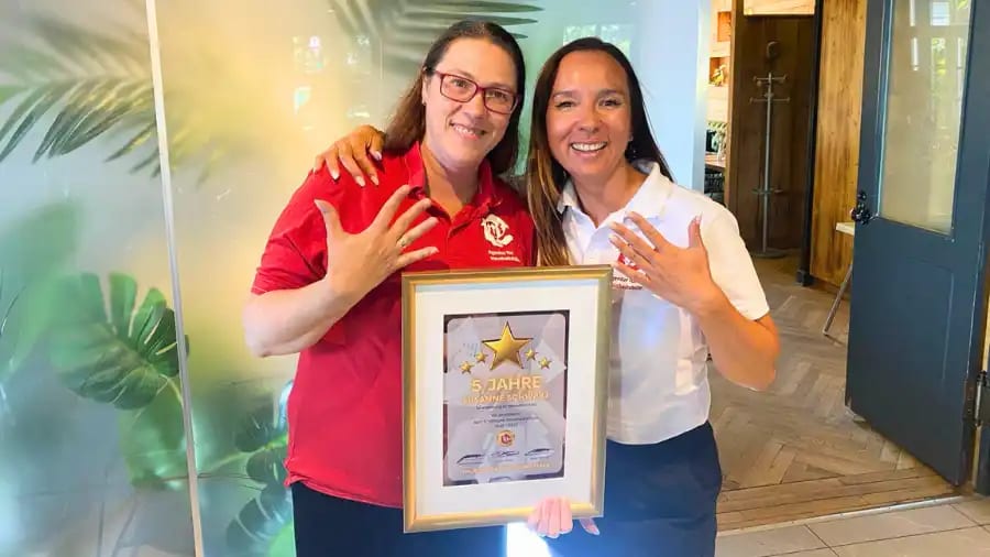 Susanne with her Outside Team Coordinator and certificate