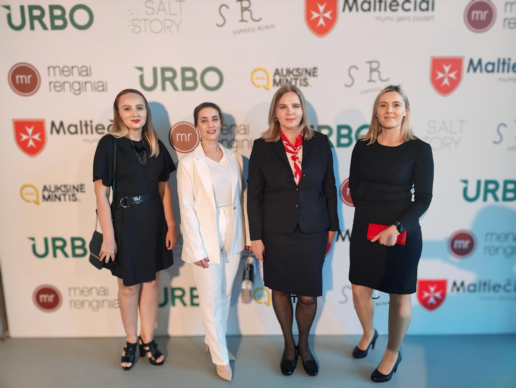 a group of women in an event