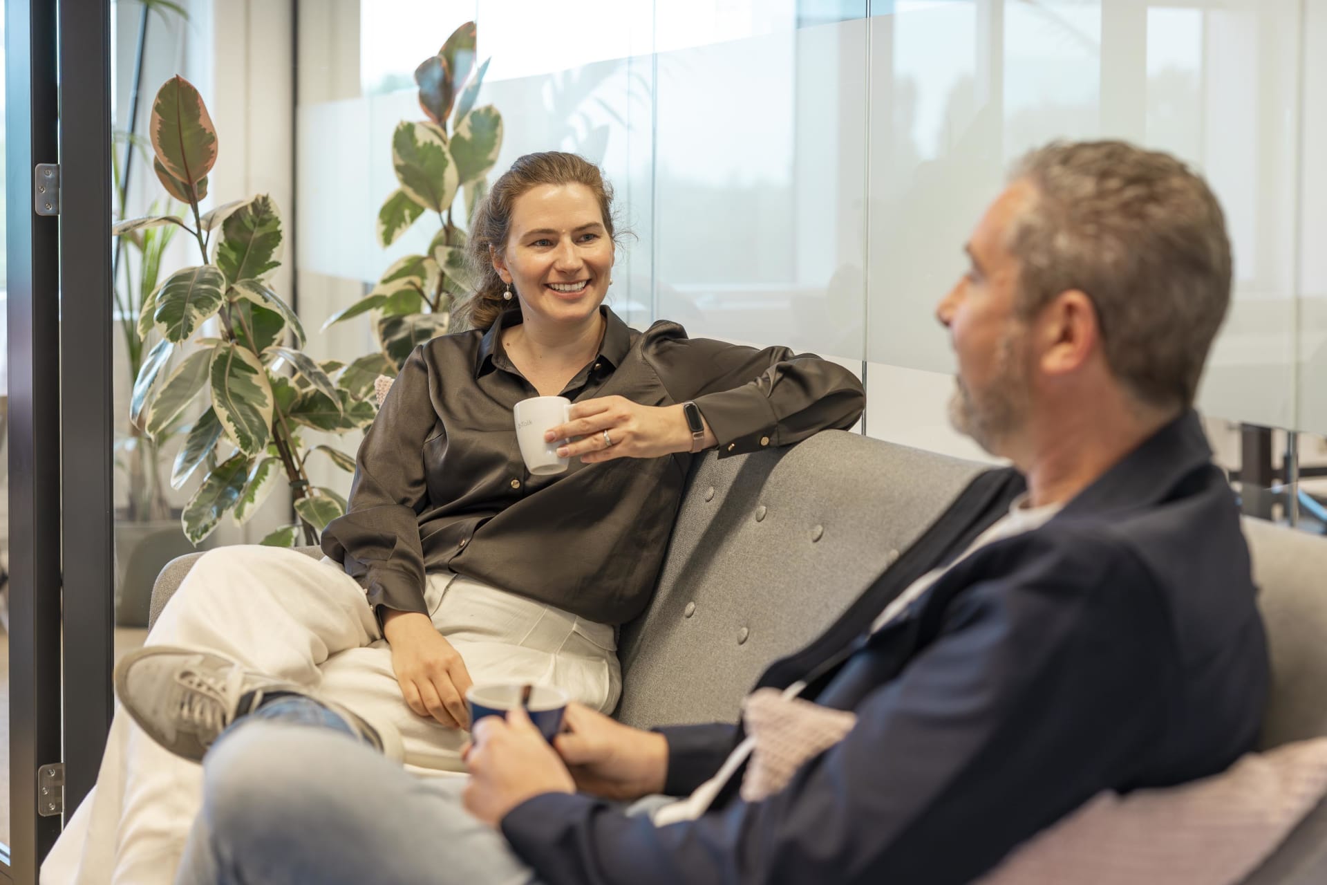 Office colleagues having a coffee chat